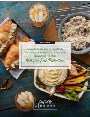 white paper cover with a variety of refrigreated salads and dips